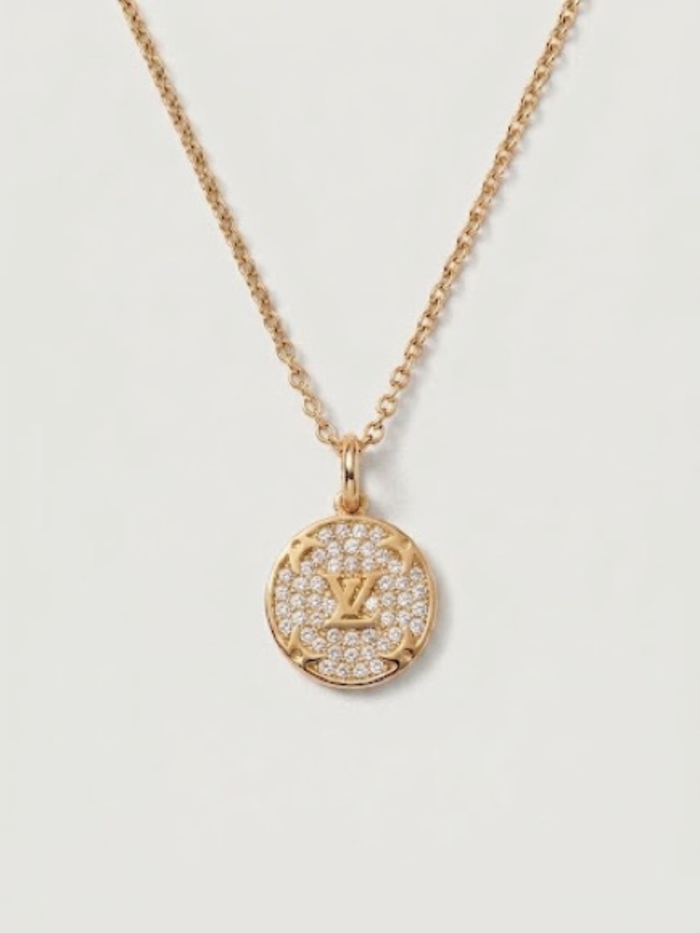 Authentic Louis Vuitton Gold and Clear Crystal Monogram Pendant Charm